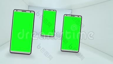 三款带有彩色<strong>按键</strong>绿色屏幕的智能<strong>手机</strong>